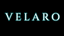 The word 'VELARO' in a glowing white font on a black background